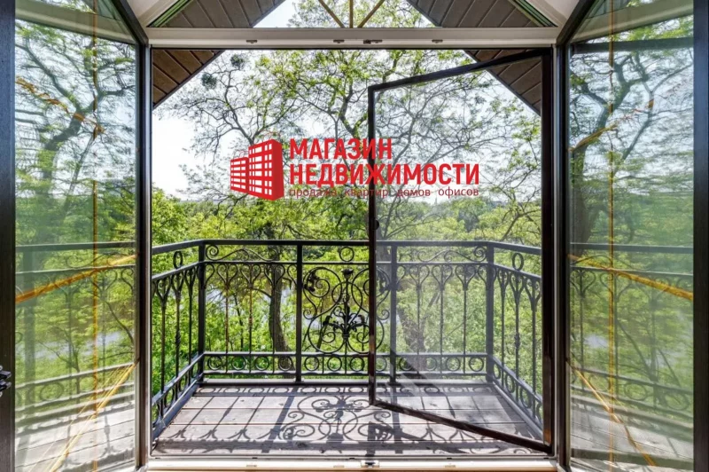 Недвижимость недели: в Гродно продают дом с ажурным балконом в 60 метрах от Нёмана Дом на Подольном переулке с видом на Неман